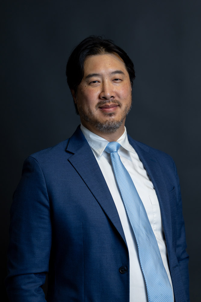 Headshot of DHKL attorney James Kan
